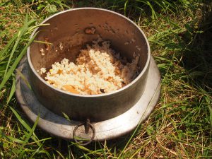 Rice cooked in an iron pot