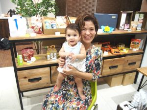 Owner of GIFT & CRAFT Mita and her baby
