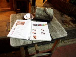 Table and Menu in front of Chikyu wo Tabisuru CAFE