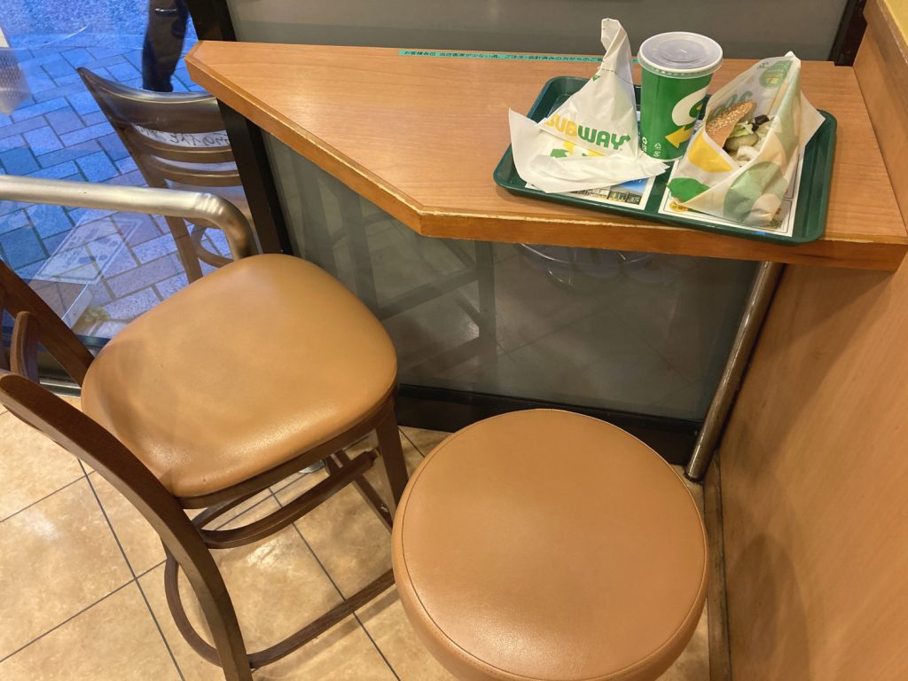 Seat at the corner of Subway